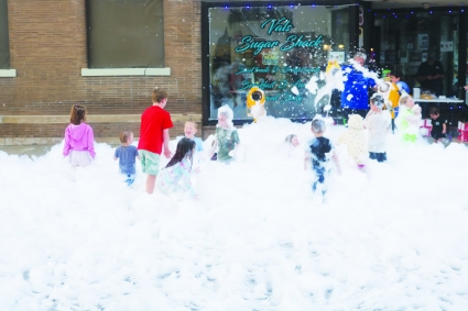 Around 7 p.m., the rain cleared, allowing for kids to enjoy the foam party activity.
