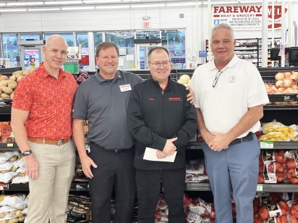 Fareway produce manager Tony Fort, pictured second from right, was one of three first prize winners in the Idaho® Potato Lovers Display contest. More than 2,000 entries were received in the contest. This is Fort’s first win. also pictured are, from left: Idaho Potato Commission Vice President of Retail Ross Johnson, Red Oak Fareway store manager Kerry Carlson, and Idaho Potato Commission Retail Promotion Director, Western U.S. Patrick Mills.